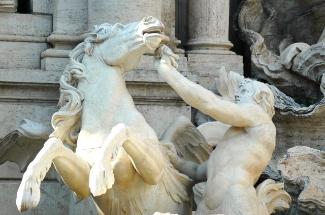 O Tritão com o cavalo rebelde.